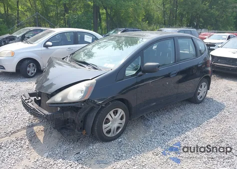 2009 Honda Fit from USA, damaged, VIN JHMGE882X9S071193